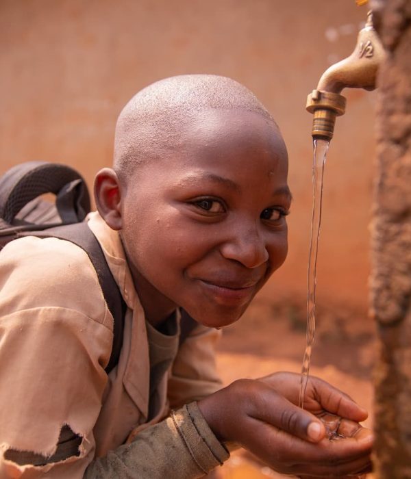 black-schoolchild-collects-water-with-his-hands-fr-2025-03-09-15-08-30-utc-1